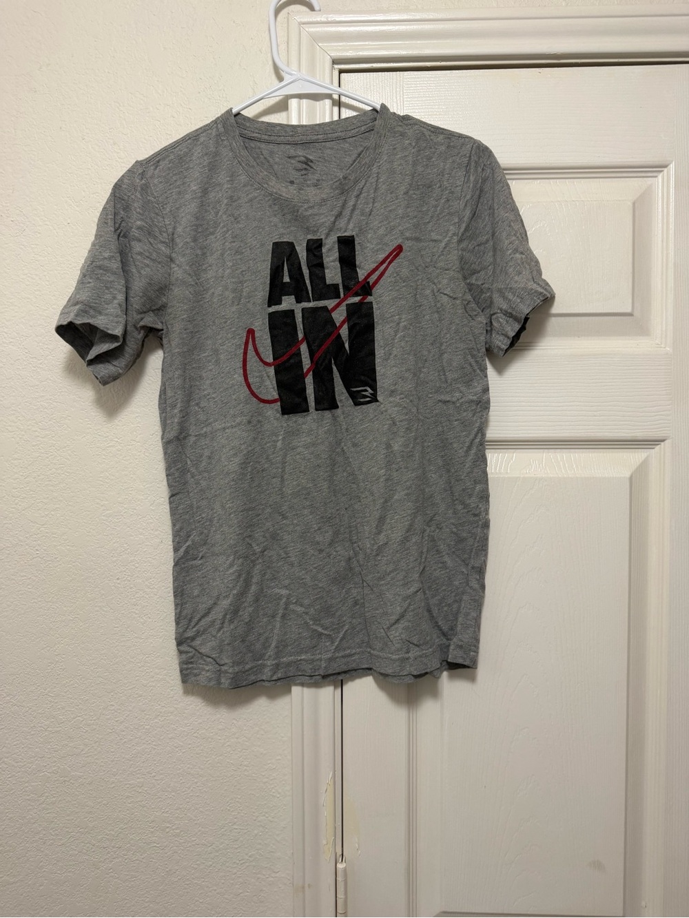 Nike Kids Gray Tee with Black & Red 'ALL IN' Graphic